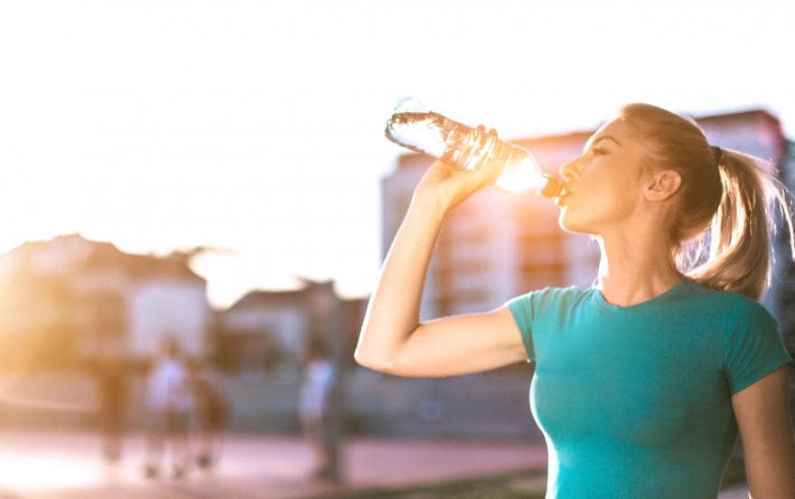 woman-drinking-water-min