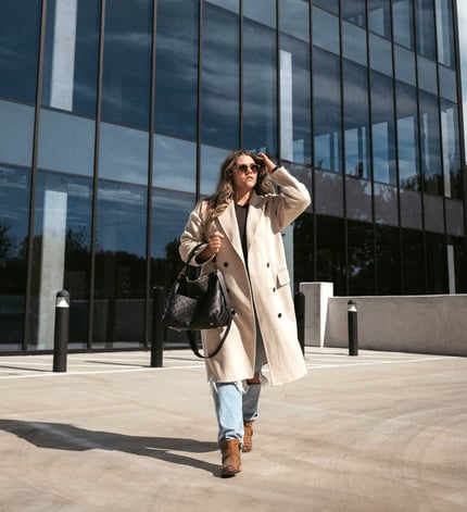 woman-in-beige-trench-coat-in-city-1